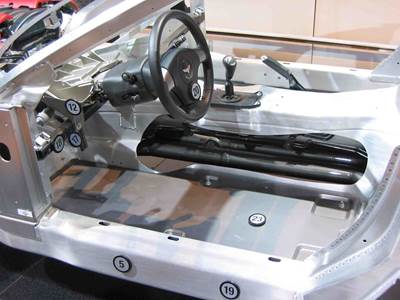Corvette converts floor panels, wheelhousings from glass to chopped carbon